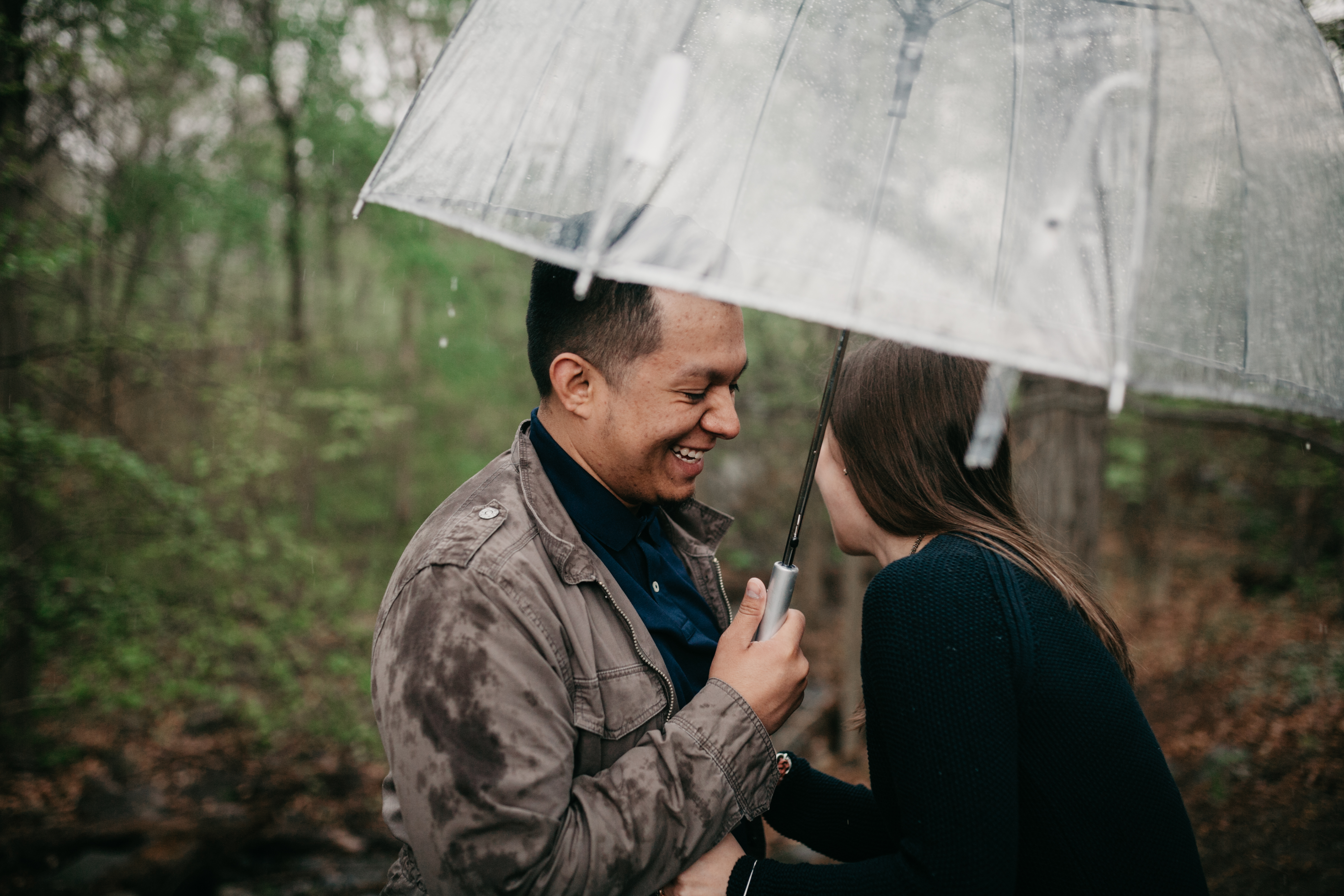 clear umbrella engagement Session and rainy day engagement session