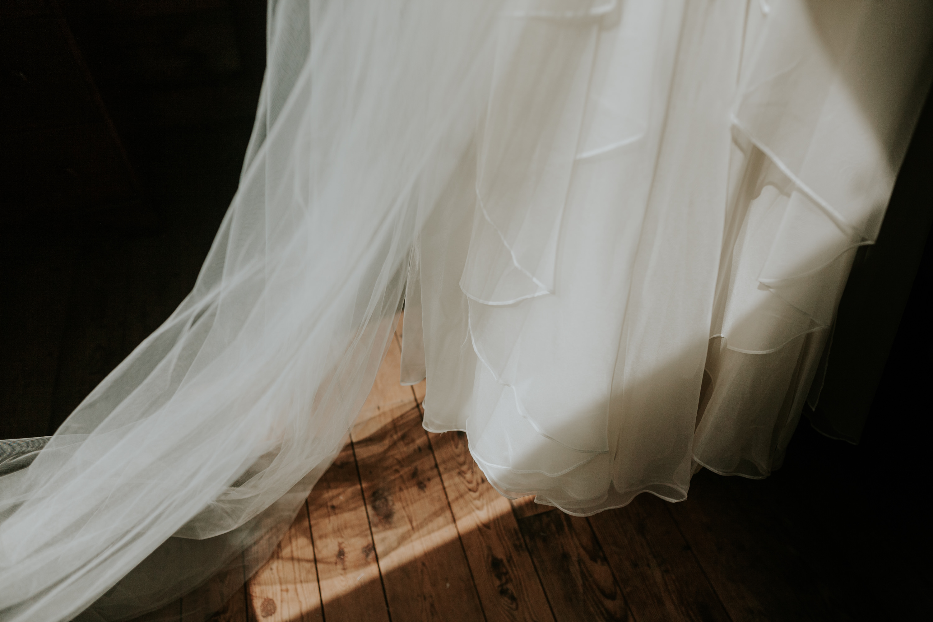 wedding dress in harsh light, flowy fabric of wedding dress, leanne marshall wedding dress