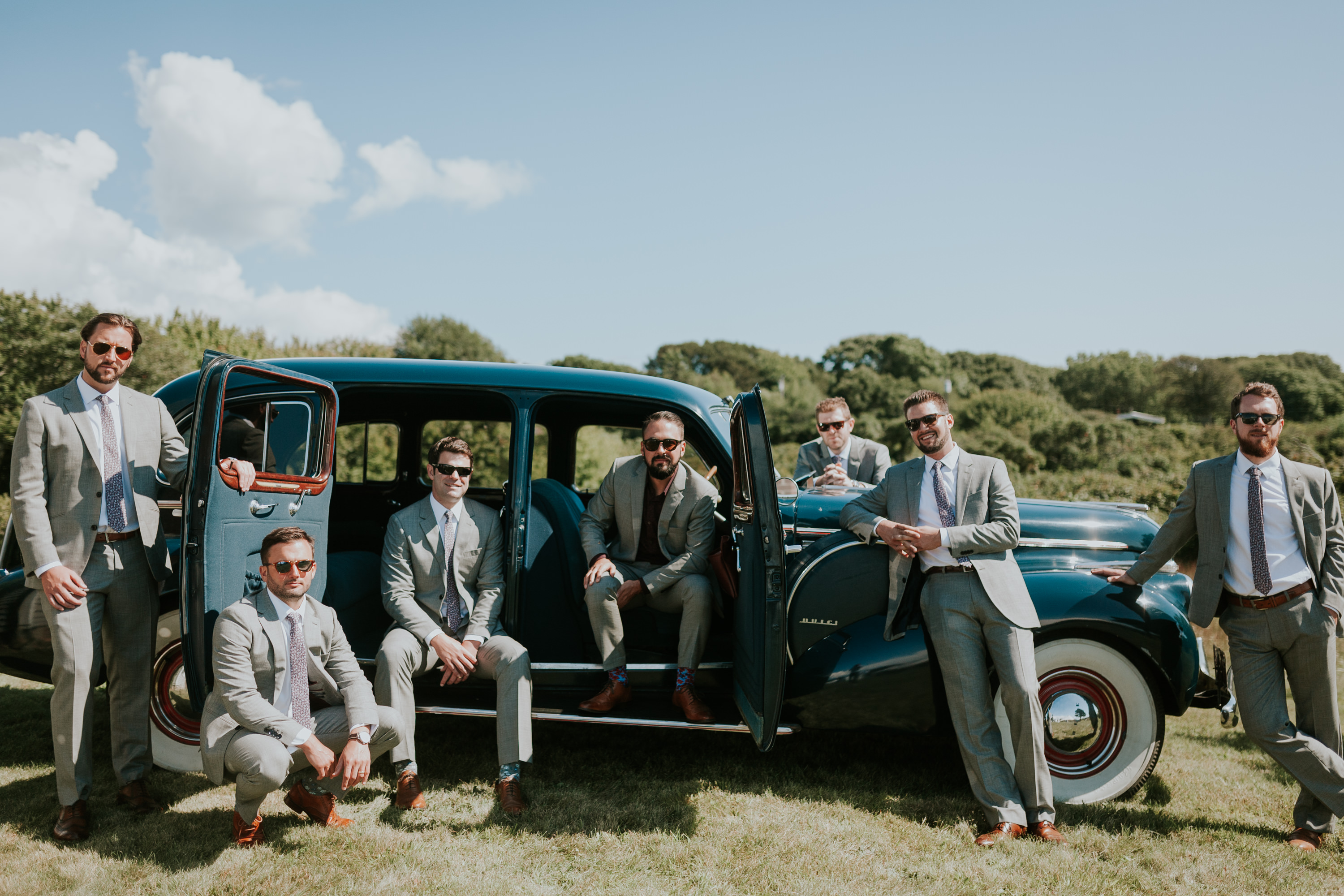 groomsmen in vintage car, groomsmen on the vineyard