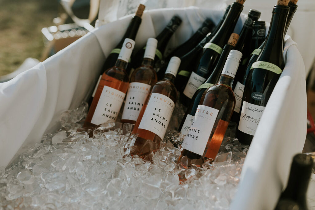 a tub full of ice and a variety of wine at a Cape Cod wedding reception