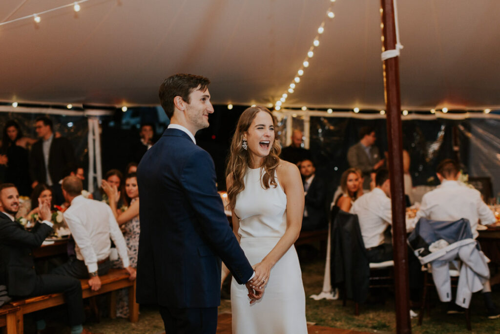 bride and groom laugh on dance floor during their first dance at a Cape Cod wedding reception