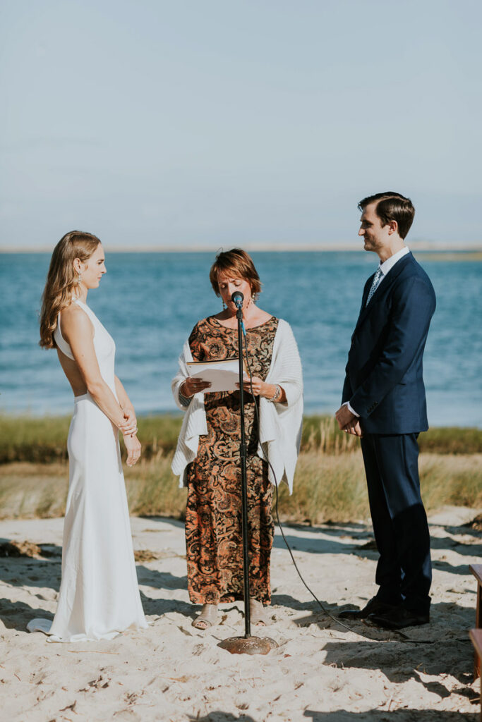 man and woman get married on the beach in Cape Cod